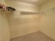 Walk-in closet with shelving and carpet, ready for organizing clothes and storage at 4814 Regalo Bello St, Las Vegas, NV 89135