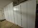 Spacious garage featuring ample storage cabinets along the wall, providing organized space at 4814 Regalo Bello St, Las Vegas, NV 89135