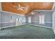 Expansive bedroom features a wood ceiling, three ceiling fans, and multiple windows offering abundant natural light at 5110 N Valadez St, Las Vegas, NV 89149