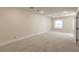 Bright bedroom with plush carpeting, and light paint at 5110 N Valadez St, Las Vegas, NV 89149