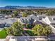 Charming home with manicured lawn, mature trees, and mountain views at 5110 N Valadez St, Las Vegas, NV 89149