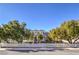 Charming two-story home with a well-manicured front yard and white picket fence at 5110 N Valadez St, Las Vegas, NV 89149