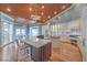 Spacious kitchen with granite countertops, hardwood floors, and stainless steel appliances at 5110 N Valadez St, Las Vegas, NV 89149