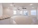 Expansive living room featuring recessed lighting, dual ceiling fans and exterior exit at 5110 N Valadez St, Las Vegas, NV 89149
