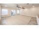 Large living space with tile, recessed lighting, ceiling fans and backyard access at 5110 N Valadez St, Las Vegas, NV 89149