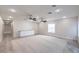 Open living area with tile accents, recessed lighting, and ceiling fans at 5110 N Valadez St, Las Vegas, NV 89149