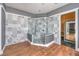 Modern shower with patterned tile, a glass enclosure, and a built-in seat, creating a spa-like experience at 5110 N Valadez St, Las Vegas, NV 89149