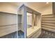 Well-organized walk-in closet with built-in shelving, drawers, and hanging rods for ample storage at 5110 N Valadez St, Las Vegas, NV 89149