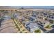 Aerial view of a new construction neighborhood with modern homes and desert landscaping at 527 Clearsable Ave, Henderson, NV 89044