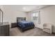 Cozy bedroom with a large window, comfortable bed, and ample natural light at 527 Clearsable Ave, Henderson, NV 89044