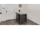 A dining nook table with seating for two, featuring dark wood floors, and neutral walls at 527 Clearsable Ave, Henderson, NV 89044
