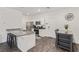 A clean, modern kitchen featuring stainless steel appliances and granite countertops at 527 Clearsable Ave, Henderson, NV 89044