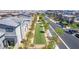 Landscaped neighborhood park featuring benches, grassy area, trees, and sidewalks at 527 Clearsable Ave, Henderson, NV 89044