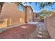 Spacious backyard with low-maintenance landscaping and a concrete patio area, perfect for outdoor entertaining at 5308 Carlsbad Heights St, North Las Vegas, NV 89081
