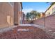 The backyard showcases an inviting space with a patio area and a low-maintenance yard, ideal for relaxing outdoors at 5308 Carlsbad Heights St, North Las Vegas, NV 89081
