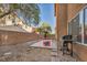 Backyard with patio area perfect for grilling and outdoor enjoyment at 5308 Carlsbad Heights St, North Las Vegas, NV 89081