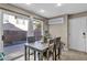 Charming dining area with a sliding glass door leading to the backyard, ideal for indoor-outdoor living at 5308 Carlsbad Heights St, North Las Vegas, NV 89081