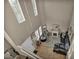 Elevated view of a living room featuring a faux fireplace, patterned rug, and comfortable seating at 5308 Carlsbad Heights St, North Las Vegas, NV 89081