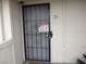Exterior view of apartment unit featuring security door and cameras at 5388 Swenson St # 26, Las Vegas, NV 89119