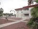 Apartment building exterior view features landscaping and mailbox area at 5388 Swenson St # 26, Las Vegas, NV 89119
