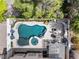 Aerial view of backyard pool featuring a jacuzzi and patio furniture at 5452 Desert Spring Rd, Las Vegas, NV 89149
