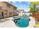 Backyard pool features a jacuzzi and multiple seating areas at 5452 Desert Spring Rd, Las Vegas, NV 89149
