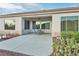 Covered patio features a seating area with views of the desert landscape at 585 Mountain Links Dr, Henderson, NV 89012
