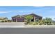 Beautiful home featuring desert landscaping, a brick driveway, and a two-car garage at 6208 W Rome Blvd, Las Vegas, NV 89131
