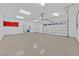 Large, well-lit garage with ample space and an automatic garage door opener system at 6208 W Rome Blvd, Las Vegas, NV 89131