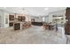 Open floorplan with bar seating, dining, and access to the outside patio at 6208 W Rome Blvd, Las Vegas, NV 89131