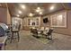 This covered patio offers ceiling fans, outdoor seating, a granite-topped bar, and a built-in barbeque at 6208 W Rome Blvd, Las Vegas, NV 89131
