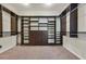 Organized walk-in closet with custom shelving and drawers providing ample storage space at 6208 W Rome Blvd, Las Vegas, NV 89131