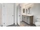 Bathroom featuring modern vanity with sink and toilet at 6346 Azurelyn Ave, Las Vegas, NV 89122