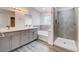 Beautiful bathroom with double vanity, bathtub, and tiled walk-in shower at 6346 Azurelyn Ave, Las Vegas, NV 89122