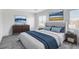 Comfortable bedroom with soft carpet, warm lighting, and a bright window at 6346 Azurelyn Ave, Las Vegas, NV 89122