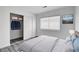 Well-lit bedroom featuring closet, soft carpeting, and a bright window at 6346 Azurelyn Ave, Las Vegas, NV 89122