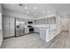 Kitchen featuring stainless appliances and gray cabinets at 6346 Azurelyn Ave, Las Vegas, NV 89122