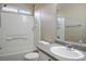 Bathroom featuring a tub, a shower, a vanity with double sinks and granite countertops at 6610 Tumbleweed Ridge Ln # 101, Henderson, NV 89011