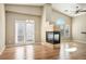 Bright living room with a fireplace and wood flooring at 6610 Tumbleweed Ridge Ln # 101, Henderson, NV 89011