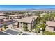 Expansive aerial view showcasing the community's well-maintained landscaping and convenient parking areas at 6635 Caporetto Ln # 204, North Las Vegas, NV 89084