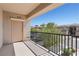 Spacious balcony provides a spot to enjoy outdoor living, fresh air, and views of the surrounding community at 6635 Caporetto Ln # 204, North Las Vegas, NV 89084