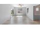 Bright, airy bedroom with light-colored wood floors, ceiling fan, and sliding glass doors at 6635 Caporetto Ln # 204, North Las Vegas, NV 89084