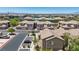 An appealing exterior view of a multi-Gathering residential complex with well-maintained landscaping and ample parking spaces at 6635 Caporetto Ln # 204, North Las Vegas, NV 89084