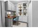 Cozy home office with built-in shelving and cabinets for efficient organization and productive work at 6635 Caporetto Ln # 204, North Las Vegas, NV 89084