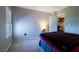 This bedroom features a closet and lots of natural light from the window at 7255 W Sunset Rd # 2030, Las Vegas, NV 89113