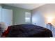 Relaxing bedroom has a window with natural light and neutral walls at 7255 W Sunset Rd # 2030, Las Vegas, NV 89113