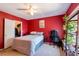 Bedroom features a comfortable bed, ample closet space, and a desk at 7255 W Sunset Rd # 2030, Las Vegas, NV 89113