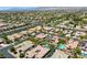 Enjoy this aerial perspective showcasing the community's well-kept homes, sparkling pools, and verdant landscapes at 7286 Mount Kearsarge St, Las Vegas, NV 89131