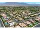 Wide aerial shot captures a well-developed neighborhood with beautiful homes and mountain views at 7286 Mount Kearsarge St, Las Vegas, NV 89131