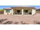 Covered back patio offering a great outdoor space for relaxation or entertaining at 7286 Mount Kearsarge St, Las Vegas, NV 89131
